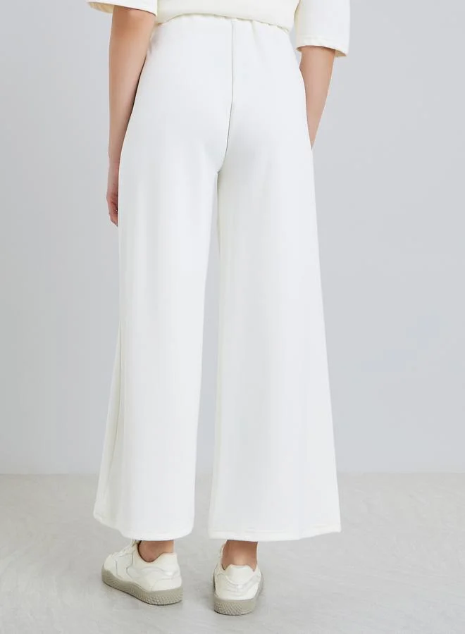 Styli  Women Off White Wide Leg Joggers for Women | Best Price UAE